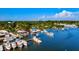 Stunning aerial view of a vibrant harbor filled with boats, docks, and waterfront establishments at 4612 4Th E Ave, Bradenton, FL 34208