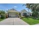 Well-maintained home with charming curb appeal, manicured landscaping, and inviting front entrance at 4612 4Th E Ave, Bradenton, FL 34208
