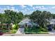 Charming single-story home with lush landscaping, well-manicured lawn, mature trees, and inviting curb appeal at 4612 4Th E Ave, Bradenton, FL 34208