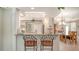Modern kitchen bar area that adjoins to the dining room, promoting interaction and showcasing layout at 4612 4Th E Ave, Bradenton, FL 34208