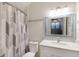 Bathroom features a shower, a sleek countertop, and an elegant mirror at 4629 Whirlaway Dr # B, Sarasota, FL 34233