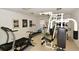 Exercise room with workout equipment including a treadmill, bike, and weight machine at 4629 Whirlaway Dr # B, Sarasota, FL 34233