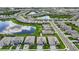 Beautiful aerial view of single-Gathering homes, serene lakes, and well-maintained landscaping in the community at 4971 Oyster Pearl St, Bradenton, FL 34211
