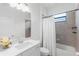 Clean bathroom with a shower-tub combo, framed mirror, and white vanity with sink at 4971 Oyster Pearl St, Bradenton, FL 34211