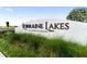 Welcome to Lorraine Lakes at Lakewood Ranch sign surrounded by lush landscaping at 4971 Oyster Pearl St, Bradenton, FL 34211