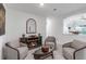 Cozy living room with a fireplace and comfortable seating arrangement at 4971 Oyster Pearl St, Bradenton, FL 34211