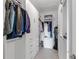Organized walk-in closet with built-in shelving and ample storage space at 4971 Oyster Pearl St, Bradenton, FL 34211