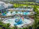 Community water park area featuring a splash pad, slides, and ample seating for families to enjoy at 4971 Oyster Pearl St, Bradenton, FL 34211