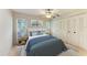 Comfortable bedroom with a large closet, soft lighting, and a cool color scheme for relaxation at 5109 28Th W St, Bradenton, FL 34207