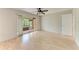 Large bedroom with wood floors and access to sunroom at 5109 28Th W St, Bradenton, FL 34207