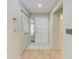 Inviting foyer with tile and wood flooring, closet, and direct view of the home's interior at 5109 28Th W St, Bradenton, FL 34207