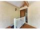 Charming front entrance featuring a wooden door, textured walls, and a ramp at 5109 28Th W St, Bradenton, FL 34207