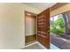 A storage room near the home entrance offers shelving and ample space at 5109 28Th W St, Bradenton, FL 34207