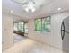 Sunroom featuring tile floors, large windows, and abundant natural light at 5109 28Th W St, Bradenton, FL 34207
