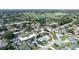 Aerial view of the property showcasing the neighborhood and a lush green golf course nearby at 5110 19Th W Ave, Bradenton, FL 34209