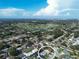 Aerial view of property near golf course, highlighting the surrounding neighborhood and greenery at 5110 19Th W Ave, Bradenton, FL 34209