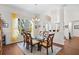 Light-filled dining room with chandelier and large window offering natural light and beautiful view at 5110 19Th W Ave, Bradenton, FL 34209