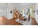 Bright dining room with a glass table, hardwood floors, and modern decor at 5110 19Th W Ave, Bradenton, FL 34209