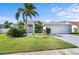 Charming single-story home with a well-maintained lawn and attached two-car garage in a desirable neighborhood at 5110 19Th W Ave, Bradenton, FL 34209