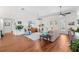 Bright living room with hardwood floors, complemented by stylish furnishings and a neutral color palette at 5110 19Th W Ave, Bradenton, FL 34209