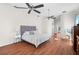 Spacious bedroom with hardwood floors, ceiling fans, and ample natural light at 5110 19Th W Ave, Bradenton, FL 34209