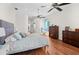 Spacious bedroom with hardwood floors, ceiling fans, and ample natural light at 5110 19Th W Ave, Bradenton, FL 34209