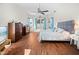 Spacious bedroom with hardwood floors, ceiling fans, and ample natural light at 5110 19Th W Ave, Bradenton, FL 34209