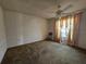 Bedroom with carpeting, neutral walls, and natural light from a window at 5114 36Th Avenue W Dr, Bradenton, FL 34209