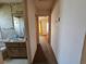Hallway leading to a bedroom and bathroom at 5114 36Th Avenue W Dr, Bradenton, FL 34209