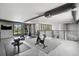 Spacious home gym with modern equipment, natural light, and open layout for a healthy lifestyle at 512 Treasure Boat Way, Sarasota, FL 34242