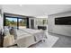 Bright main bedroom with pool view, desk, and modern design throughout at 512 Treasure Boat Way, Sarasota, FL 34242