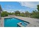 Gorgeous pool with brick patio and peaceful canal views, creating the perfect outdoor oasis at 512 Treasure Boat Way, Sarasota, FL 34242