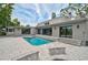 Contemporary home featuring inviting backyard pool and patio, perfect for entertaining guests at 512 Treasure Boat Way, Sarasota, FL 34242