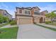 Stunning two-story townhome with attached two car garage and well-manicured lawn at 5191 78Th St E Cir, Bradenton, FL 34203