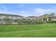 Community pool area showcasing a pool, pool house, and manicured landscaping at 5191 78Th St E Cir, Bradenton, FL 34203