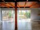 Bright open living space with tile flooring and sliding glass doors leading to the backyard at 5439 3Rd E St, Bradenton, FL 34203