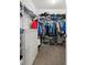 Walk-in closet offering organized storage, shelving, and ample space at 5659 Woodland Sage Dr, Sarasota, FL 34238