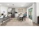 Kitchen with island, stainless steel appliances, and open floor plan at 5659 Woodland Sage Dr, Sarasota, FL 34238