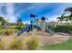 Community playground featuring a fun play structure for children to enjoy at 5659 Woodland Sage Dr, Sarasota, FL 34238