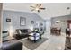 Expansive living room with an open floor plan, tile flooring, comfortable seating, and lots of natural light at 5823 Helen Way, Sarasota, FL 34243
