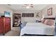 This spacious bedroom features soft natural light and comfortable furnishings at 5823 Helen Way, Sarasota, FL 34243