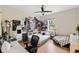 Comfortable bedroom with personal decorations, including vinyl records and movie posters, adding character to the room at 601 Suffolk Cir, Nokomis, FL 34275