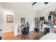 Personal bedroom space boasting unique posters and desk area at 601 Suffolk Cir, Nokomis, FL 34275