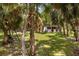 Image of fenced perimeter with lush landscaping on property at 601 Suffolk Cir, Nokomis, FL 34275