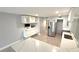 This kitchen is equipped with new appliances and stylish cabinetry at 6400 46Th N Ave # 113, Kenneth City, FL 33709
