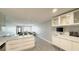 Open-concept layout seamlessly connects the kitchen, dining, and living areas, perfect for entertaining at 6400 46Th N Ave # 113, Kenneth City, FL 33709