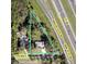 Aerial view showcasing property lines and proximity to major highways at 6923 13Th E Ave, Bradenton, FL 34208