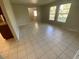 Bright dining area with tile flooring and large windows for lots of natural light at 6923 13Th E Ave, Bradenton, FL 34208