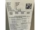 Close-up of the HVAC unit label showing its specifications and model number at 6923 13Th E Ave, Bradenton, FL 34208