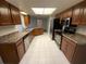 Bright kitchen with stainless steel appliances and abundant cabinet space at 6923 13Th E Ave, Bradenton, FL 34208